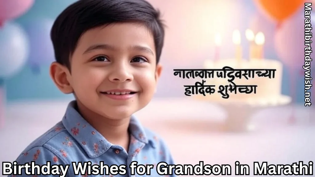 Smiling boy beside lit birthday cake with Marathi greeting text.